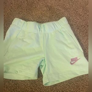 nike youth sweat-shorts, never worn, teal shorts with purple nike symbol